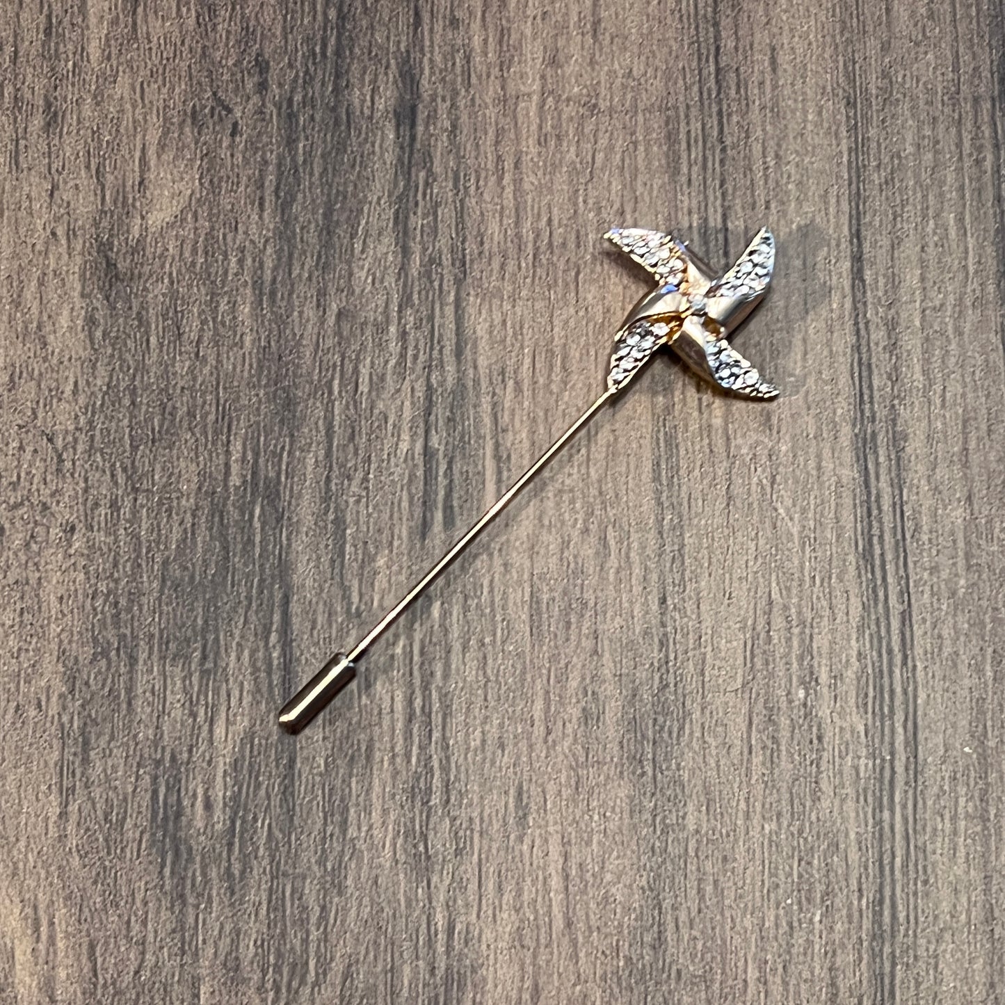 Tasker & Shaw | Luxury Menswear | Golden pinwheel with crystals lapel pin