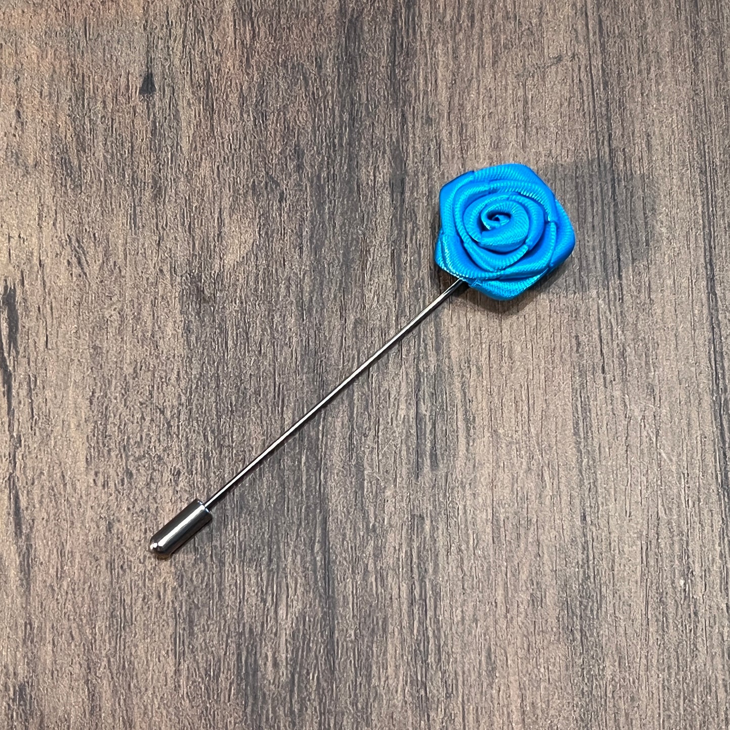 Tasker & Shaw | Luxury Menswear | Electric blue rose flower lapel pin
