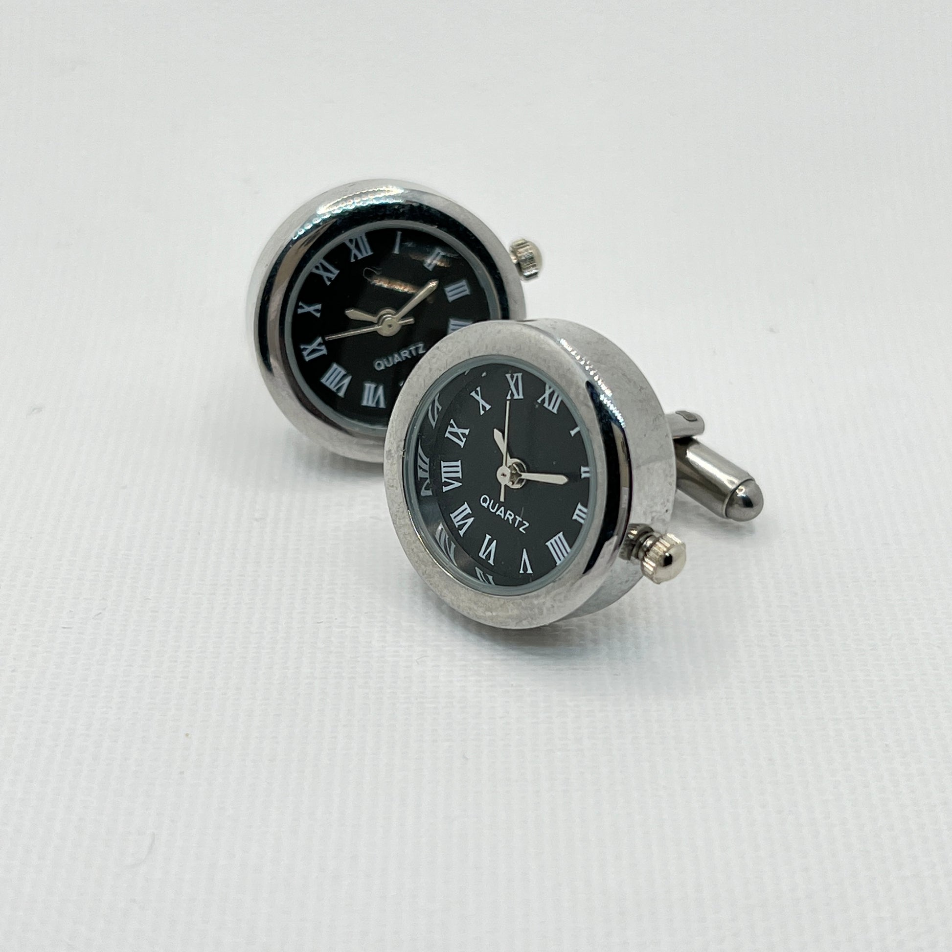 Tasker & Shaw | Luxury Menswear | Round silver working clock cufflinks with black face