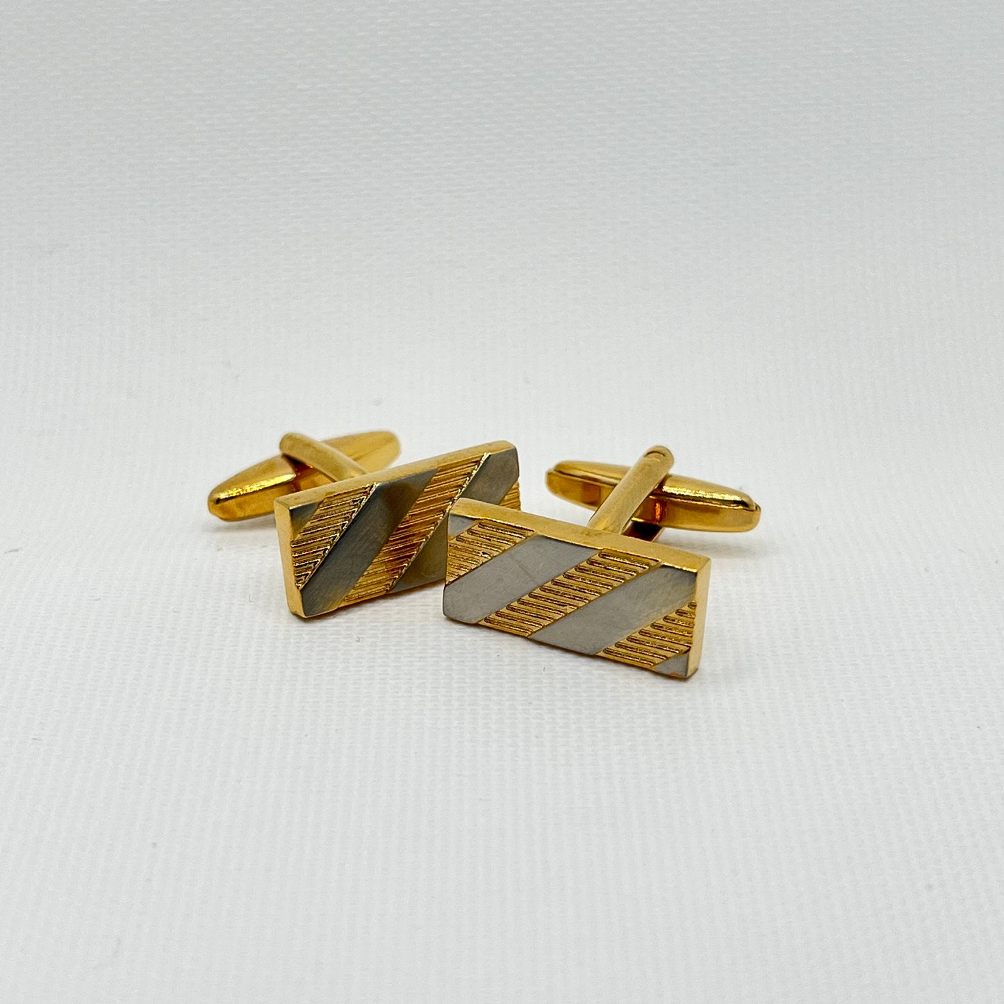 Tasker & Shaw | Luxury Menswear | Gold rectangle cufflinks with silver diagonal stripe