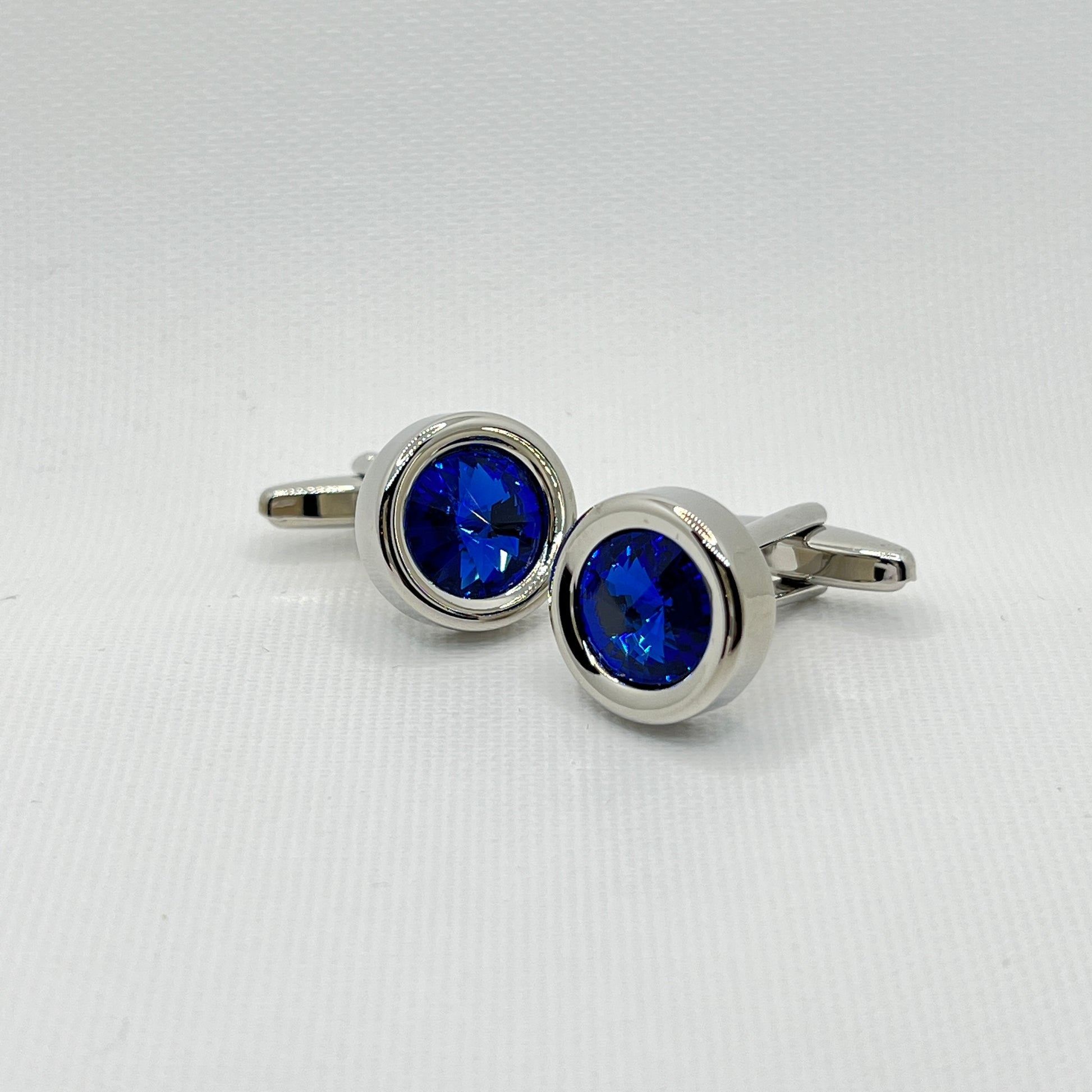 Tasker & Shaw | Luxury Menswear | Round silver with bright blue crystal cufflinks