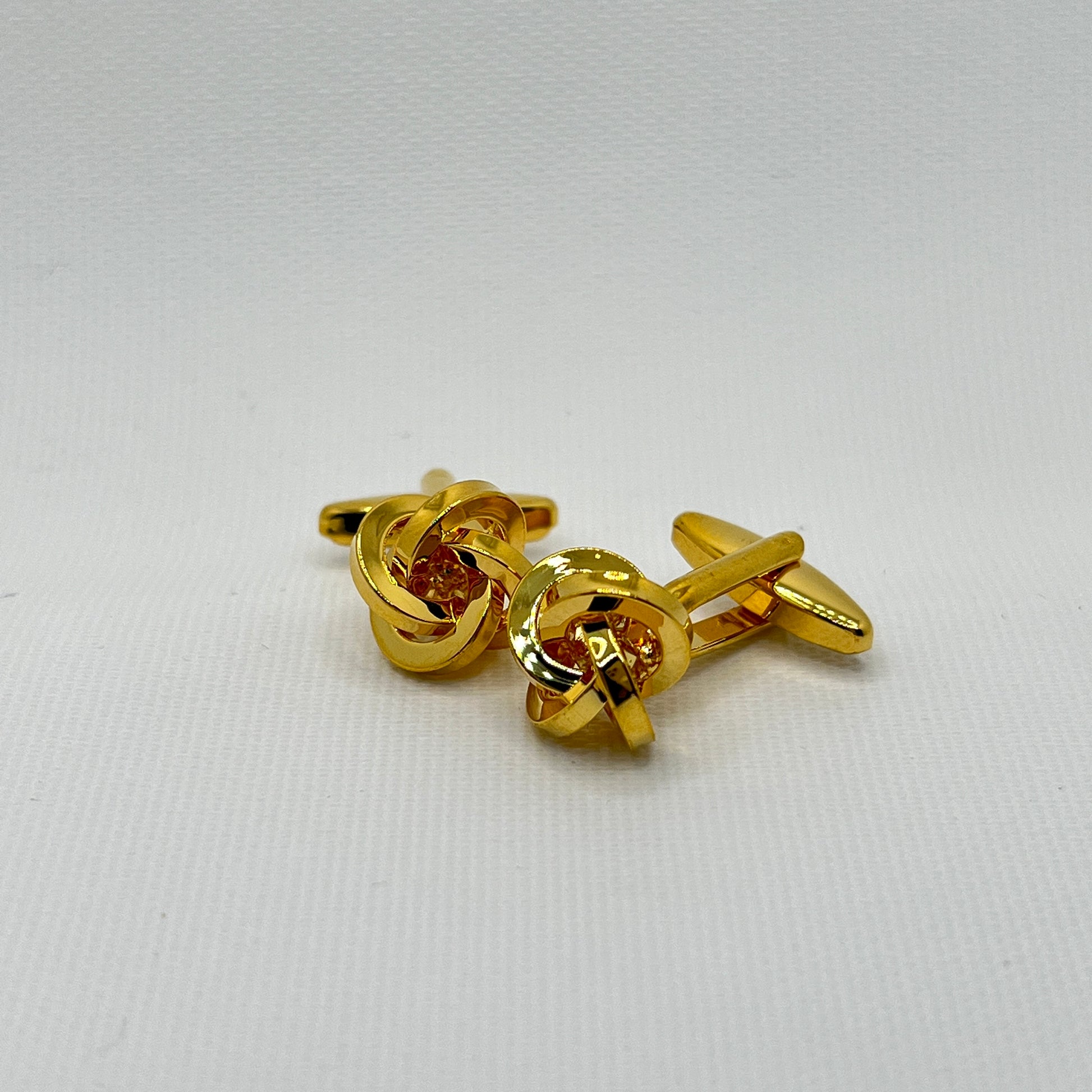 Tasker & Shaw | Luxury Menswear | Gold loop knot