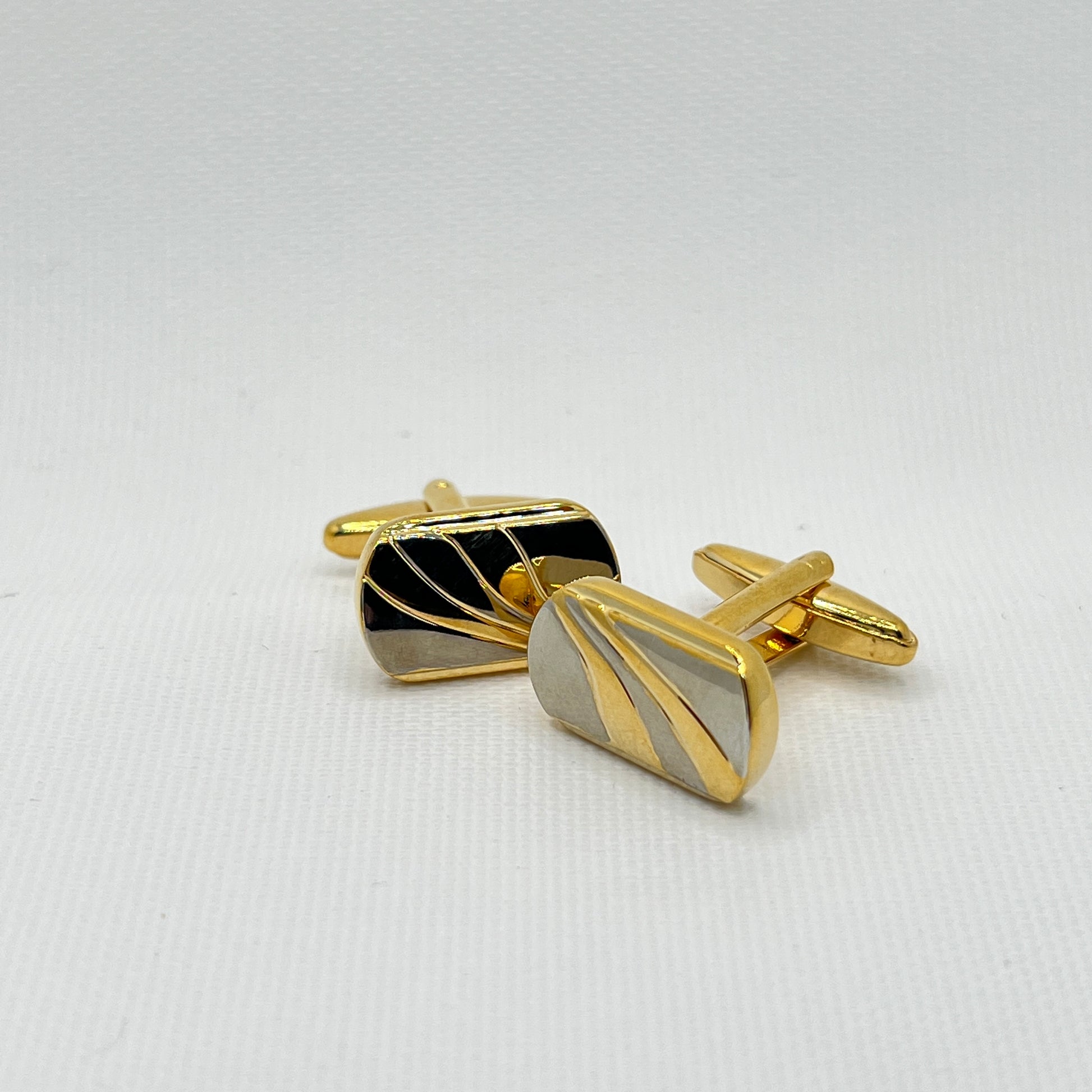 Tasker & Shaw | Luxury Menswear | Oblong gold cufflinks with silver inlay