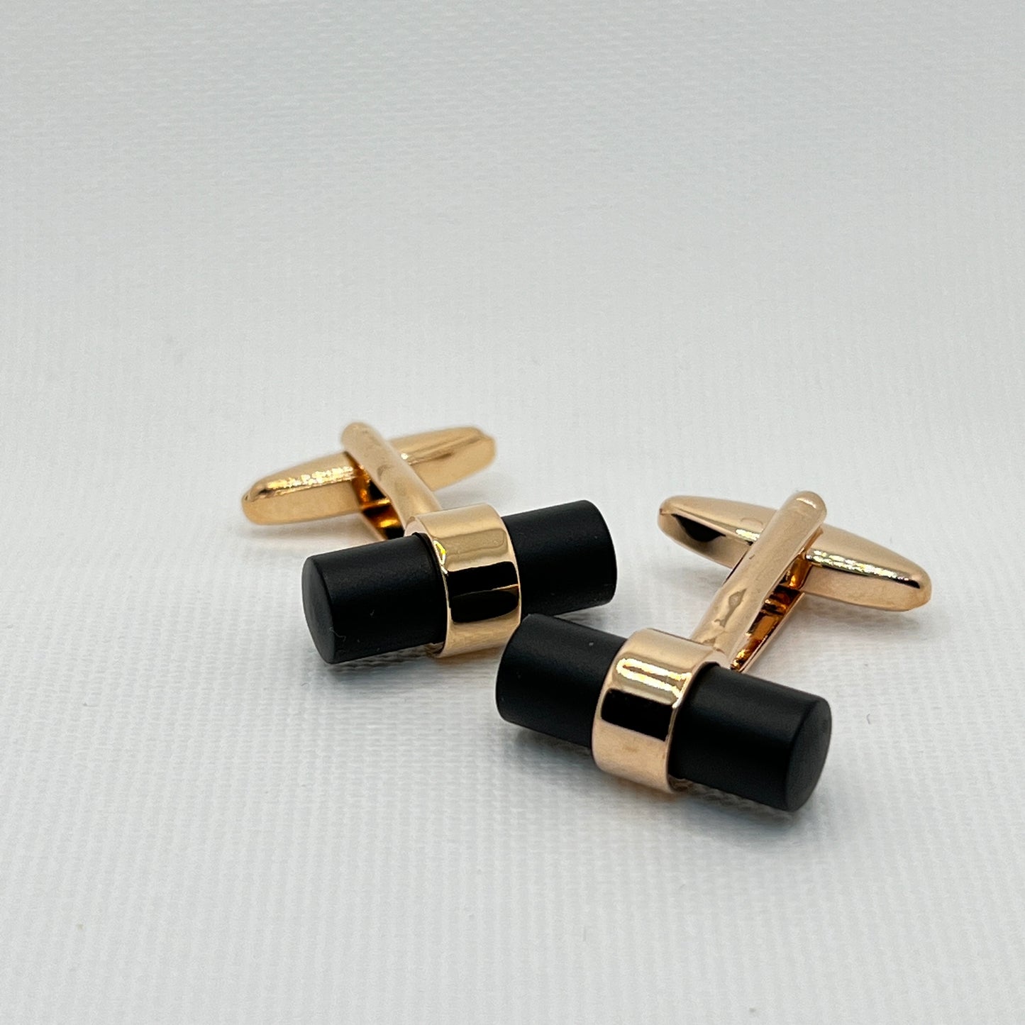 Tasker & Shaw | Luxury Menswear | Rose gold cufflinks with matt black barrel detail