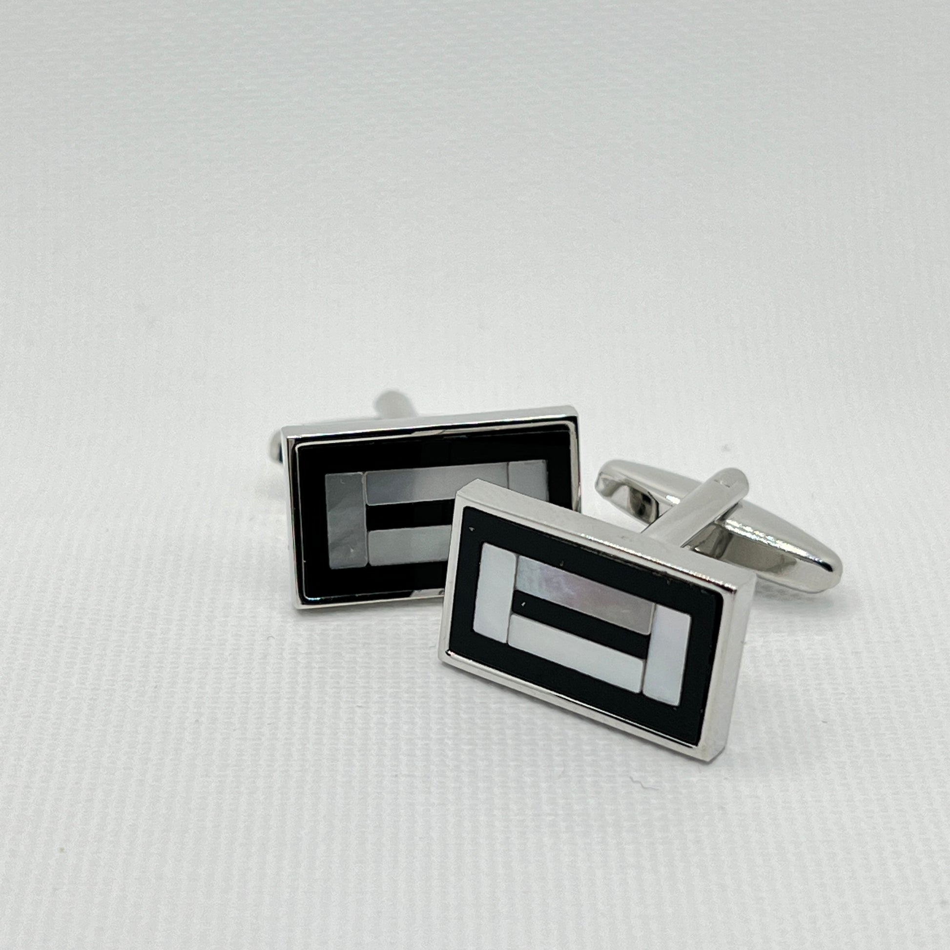 Tasker & Shaw | Luxury Menswear | Oblong cufflinks with black & mother of pearl inlayed pattern