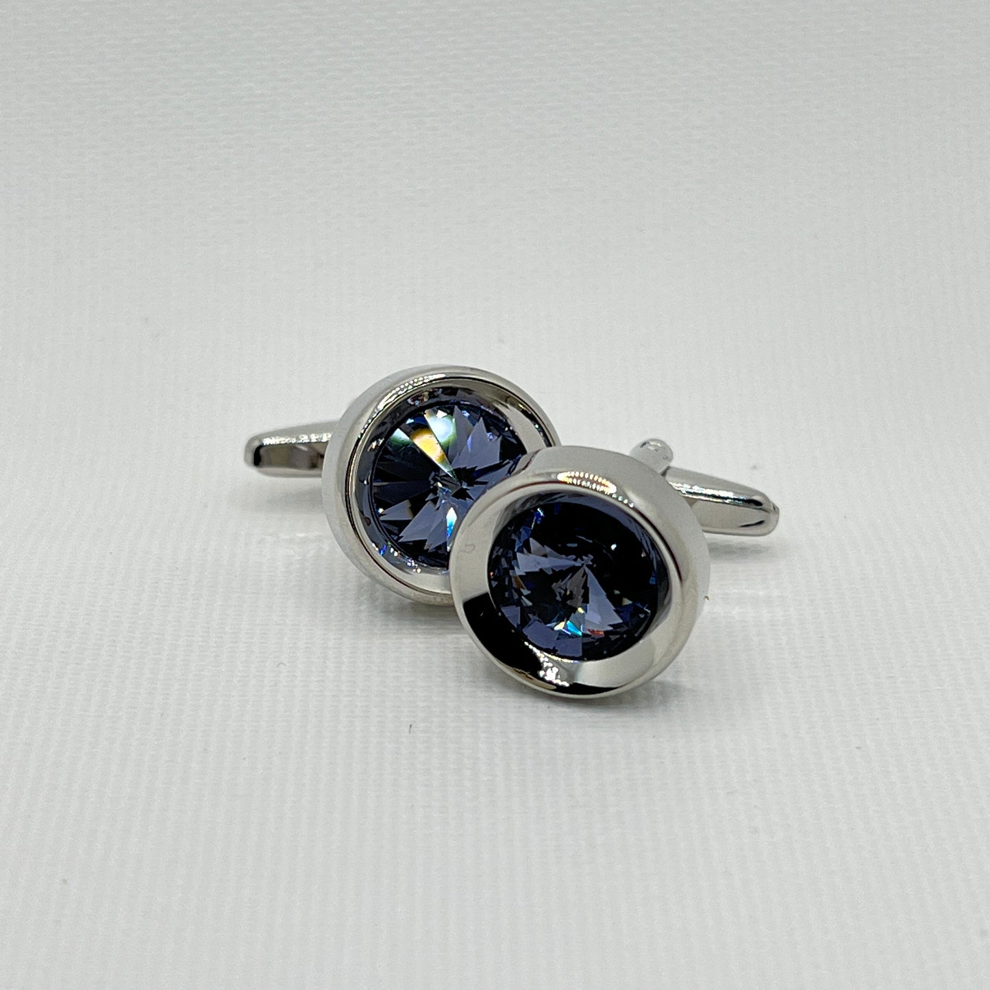 Tasker & Shaw | Luxury Menswear | Round silver cufflinks with blue crystal