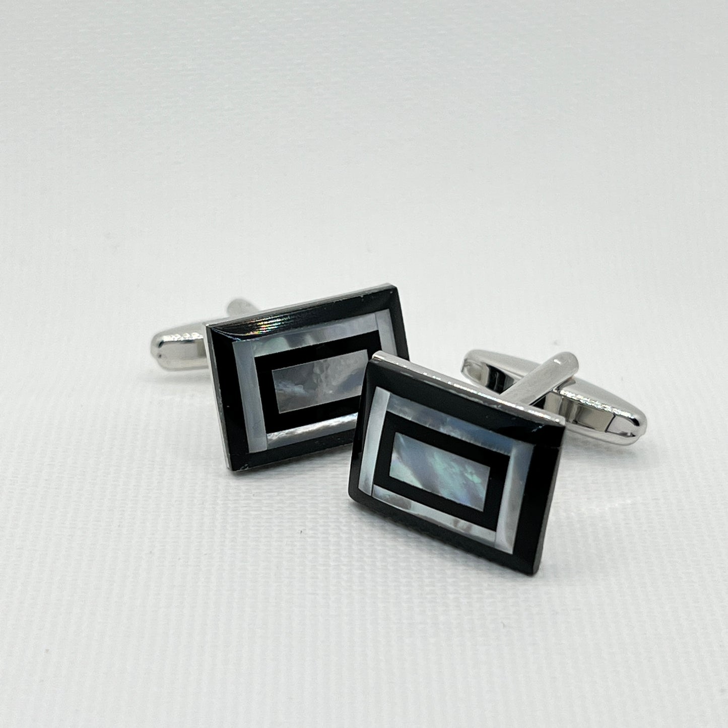 Tasker & Shaw | Luxury Menswear | Silver cufflink with black and mother of pearl concentric pattern