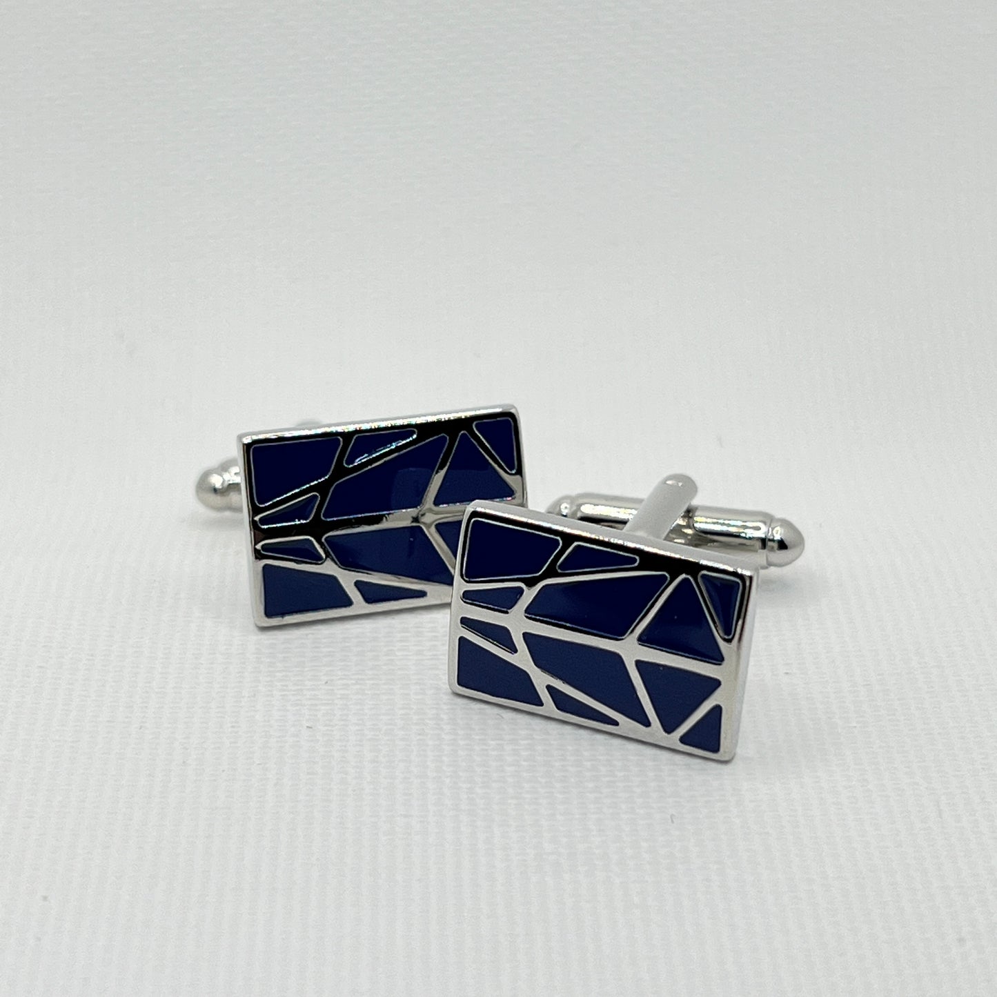 Tasker & Shaw | Luxury Menswear | Silver cufflinks with blue and silver asymmetric pattern