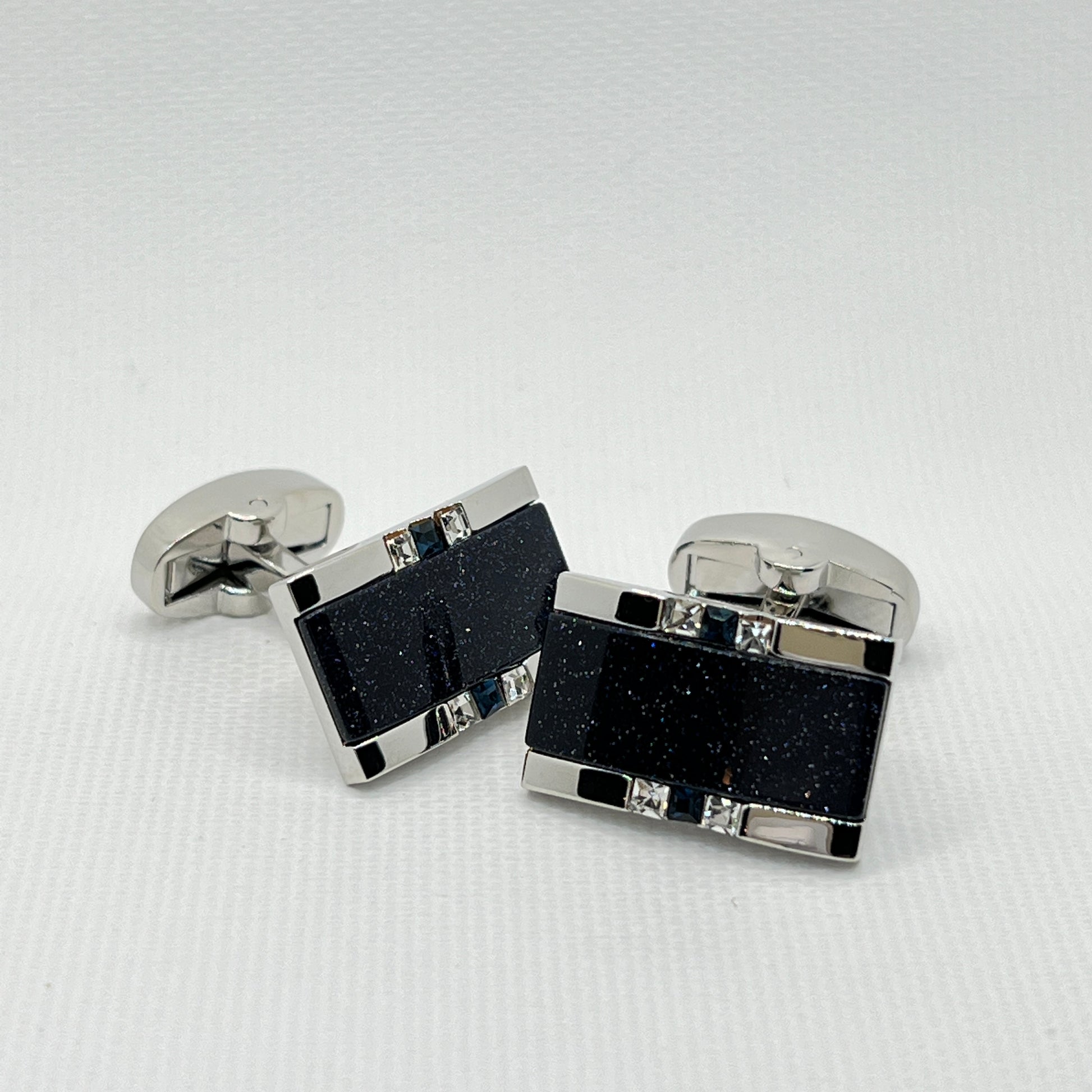 Tasker & Shaw | Luxury Menswear | Silver rectangluar cufflinks with shimmering darkest blue inlay