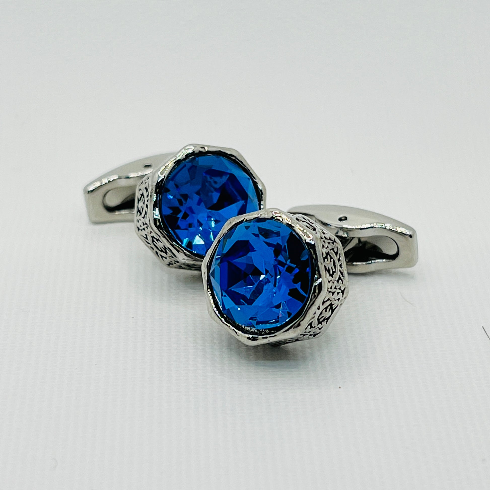 Tasker & Shaw | Luxury Menswear | Octagonal carved cufflinks with large vivid blue crystal