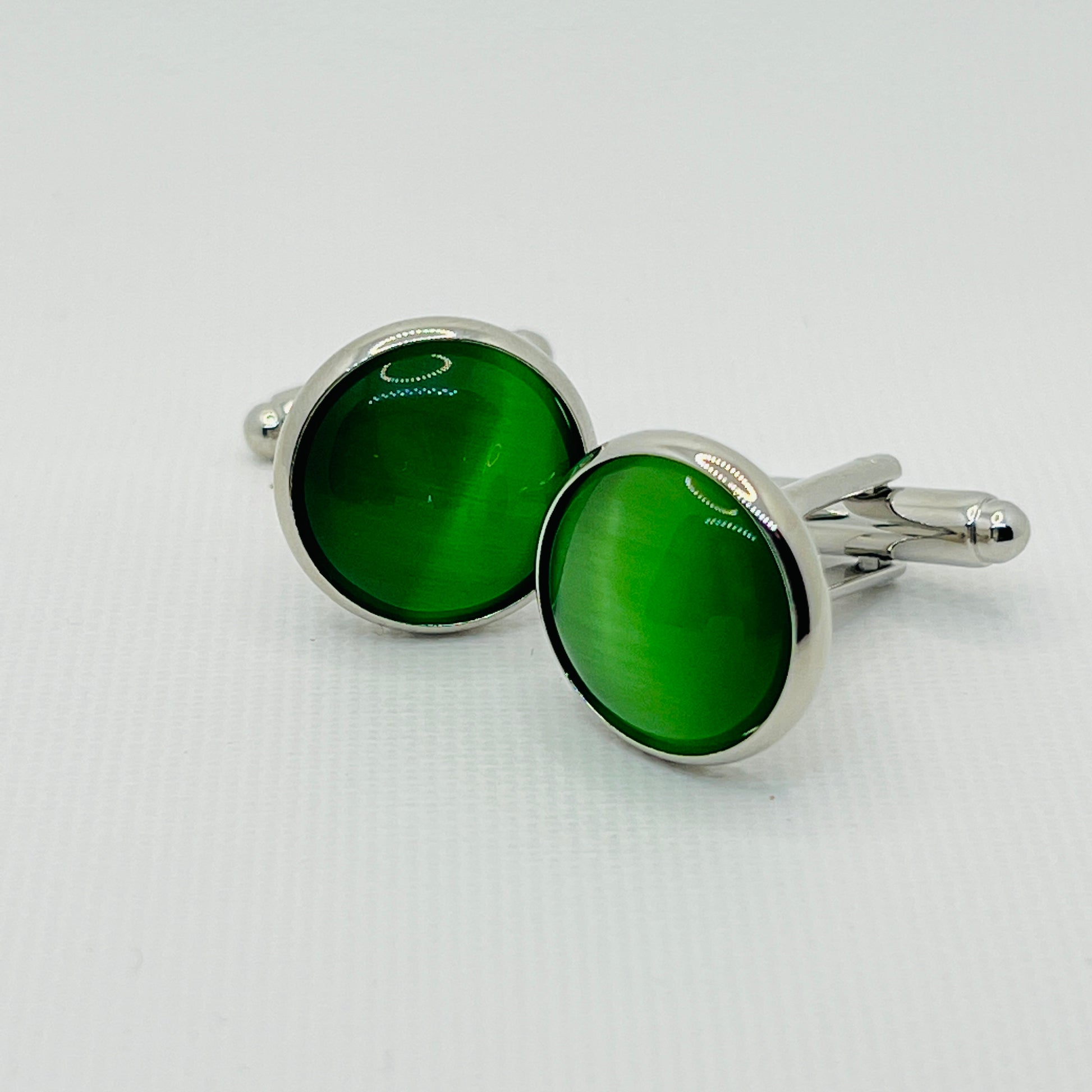Tasker & Shaw | Luxury Menswear | Round silver cufflinks with vivid green inlaid face